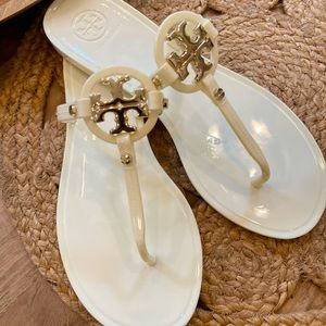 Tory Burch creamy white logo sandals with Gold detail